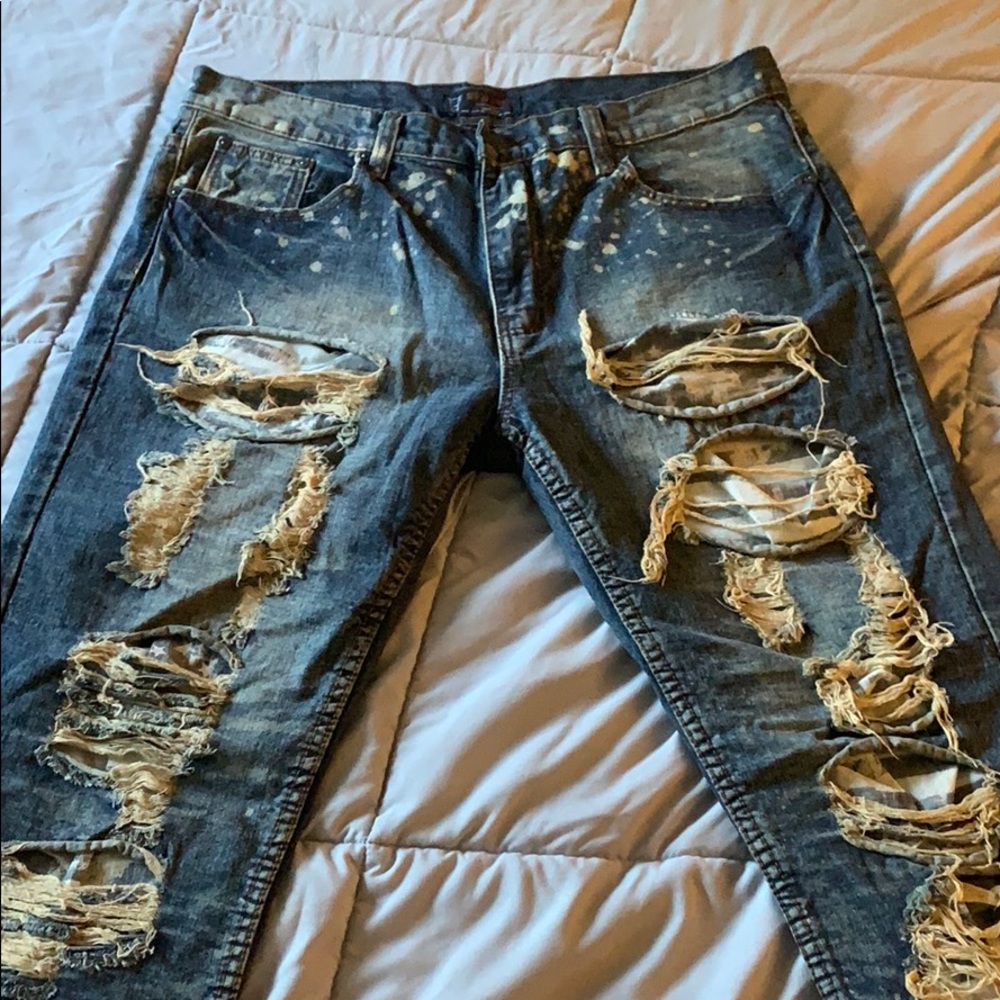 Distressed paint splattered jeans